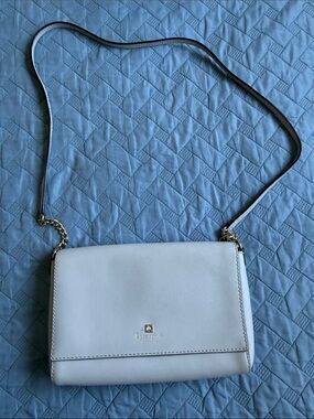 Kate Spade light gray leather crossbody with gold hardware
